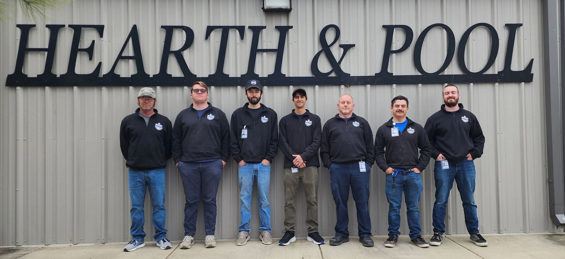 The Hearth & Pool team outside the shop on Highway 82